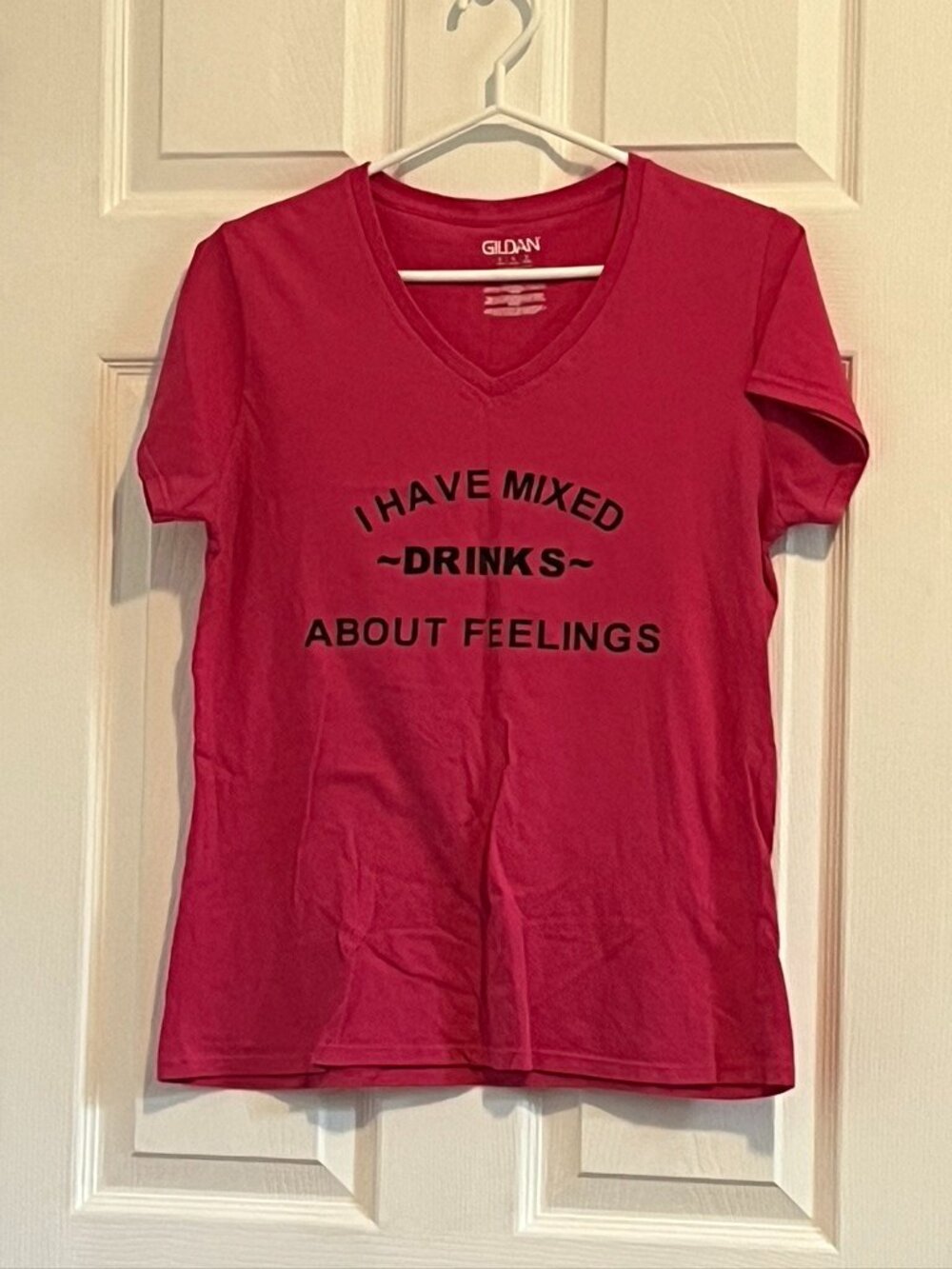 Pink t-shirt with comedic phrase printed